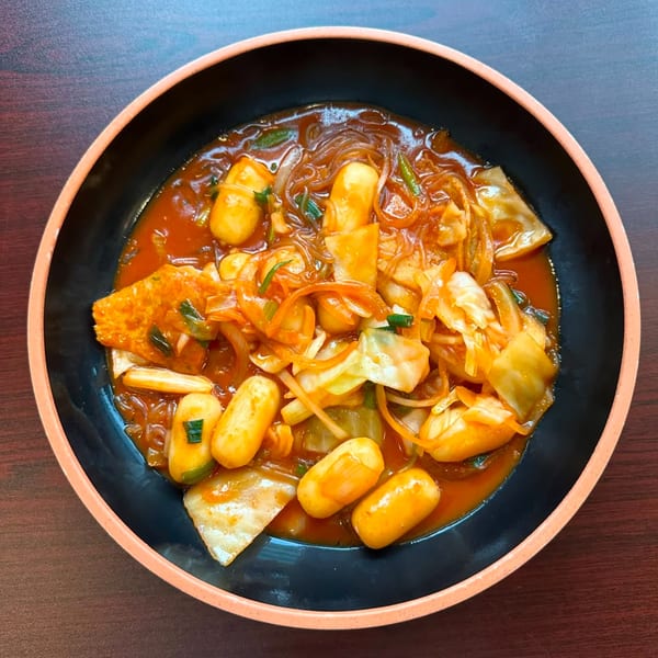 Kimchi House @ Koreana's Tteokbokki, a Korean dish with rice cakes, fish cakes, and vegetables in red chili sauce.